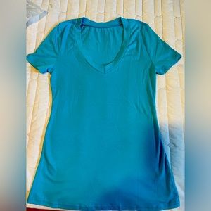 Turquoise V-neck shirt